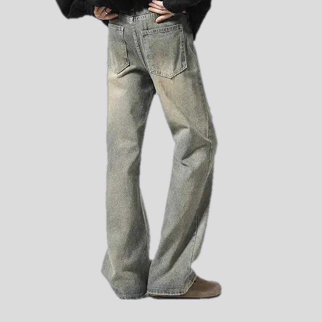 Fashionable bootcut distressed men's jeans