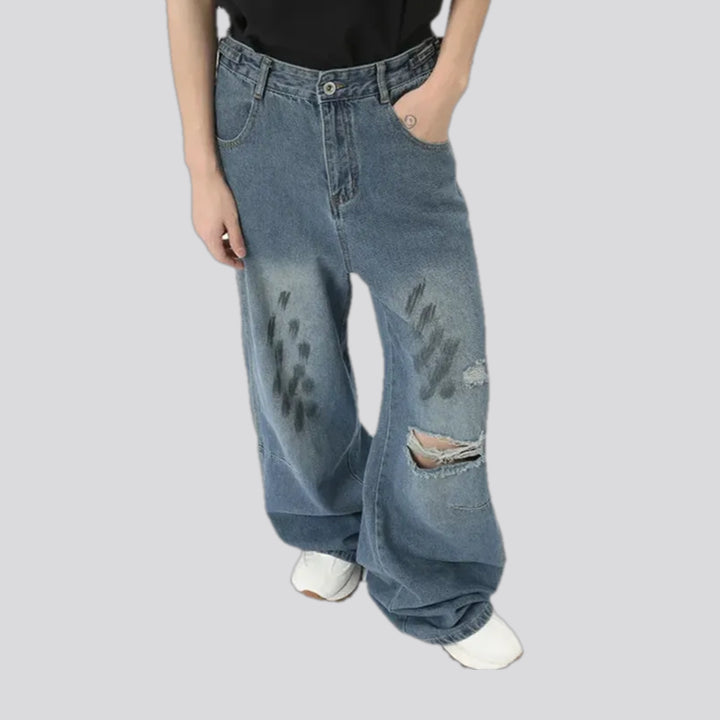 Ripped whiskered grunge jeans for men