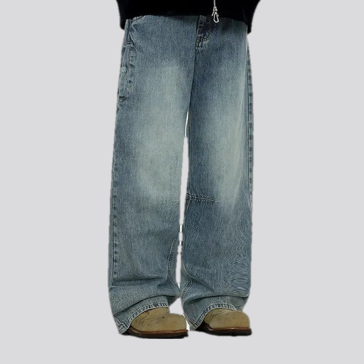 Baggy style and faded wash men's jeans