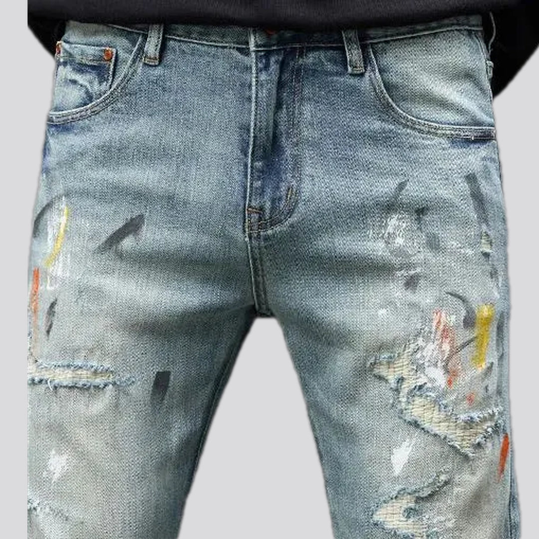 Distressed art style jeans for men