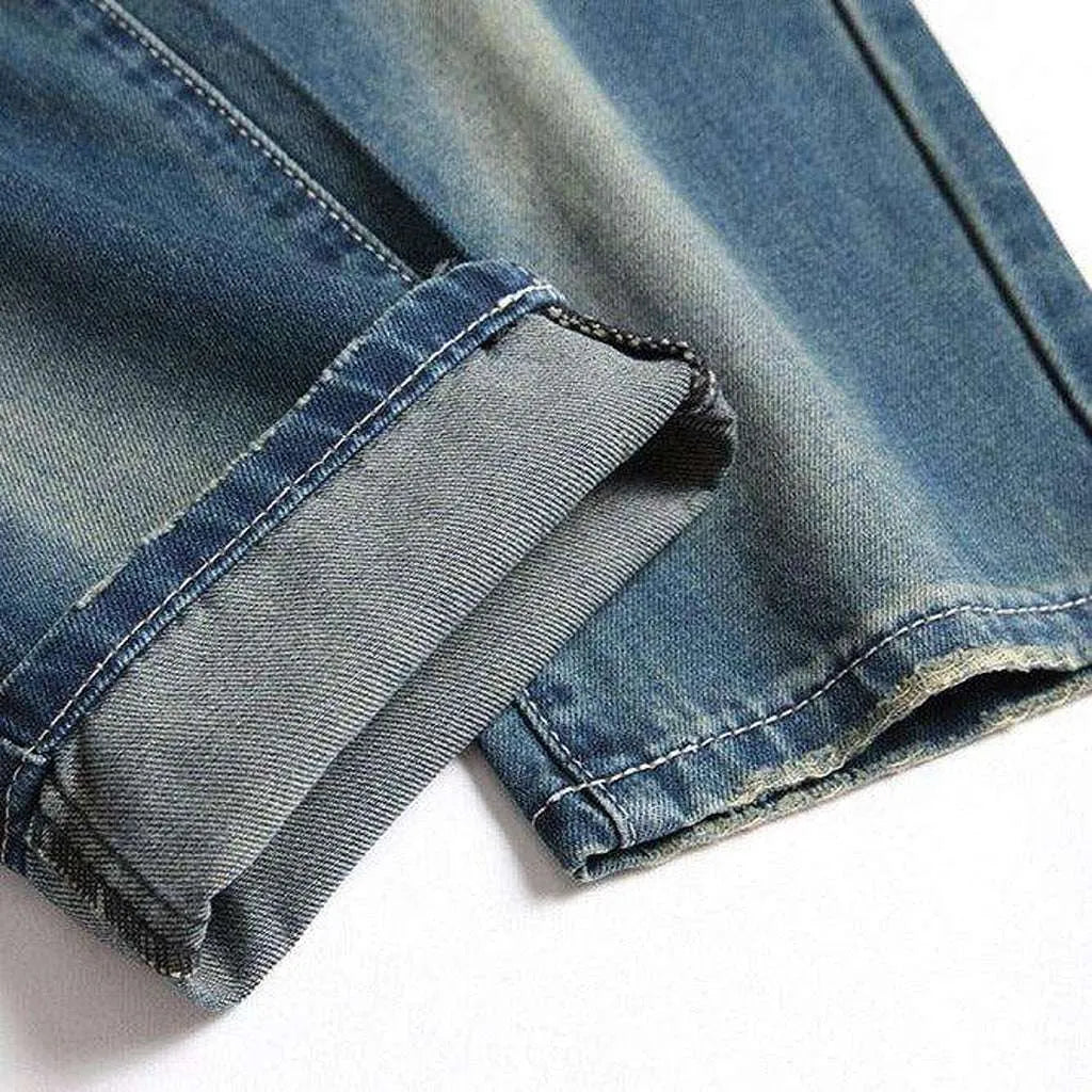 Men's jeans with color rips