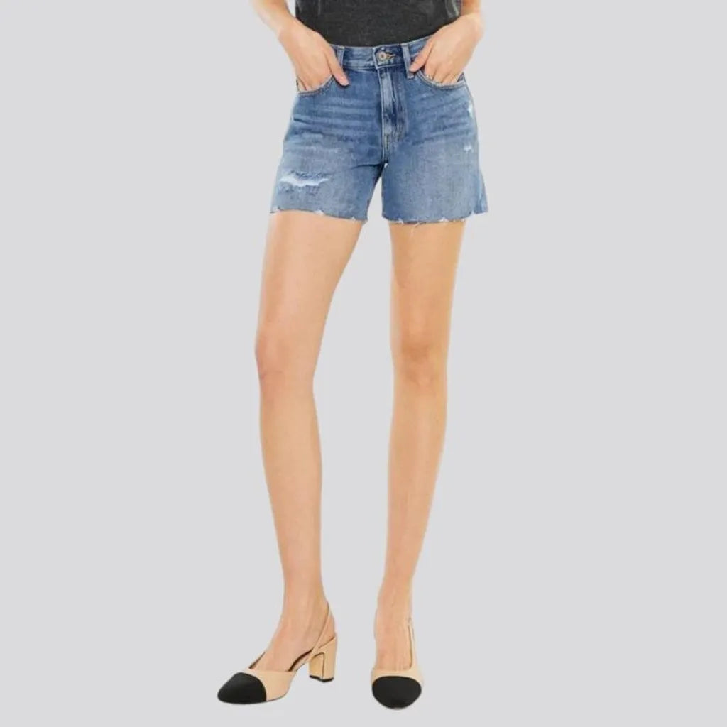 Medium-wash whiskered jeans shorts for women