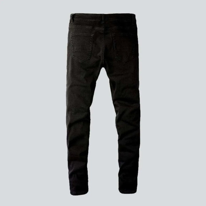 Black leather patch biker jeans