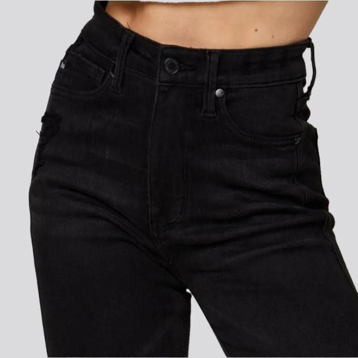 Ripped-knees women's bootcut jeans