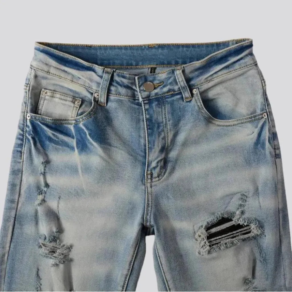 Light-wash whiskered jeans
 for men