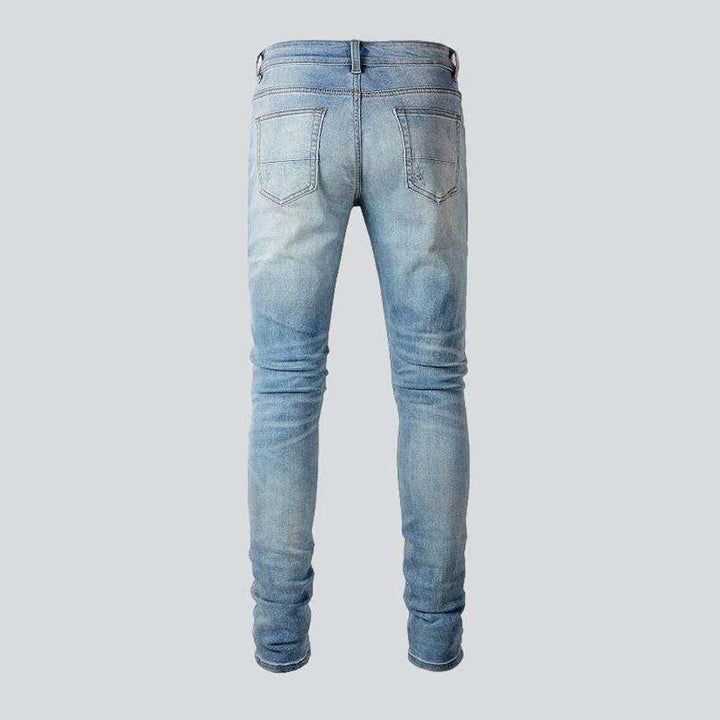 Patched distressed jeans for men