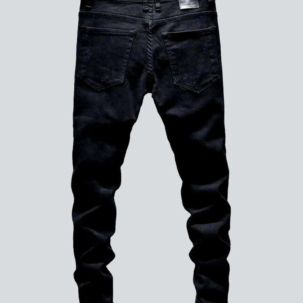 Black distressed jeans for men