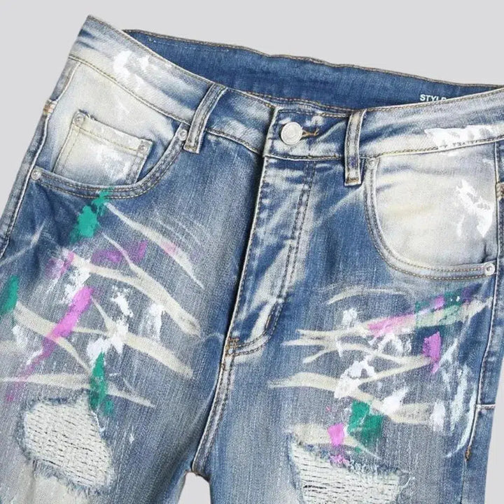 Mid-waist distressed jeans