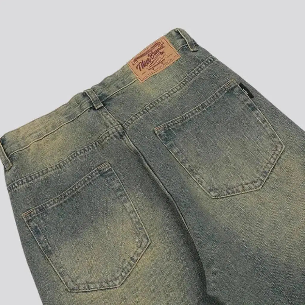 Medium-wash whiskered jeans
 for men