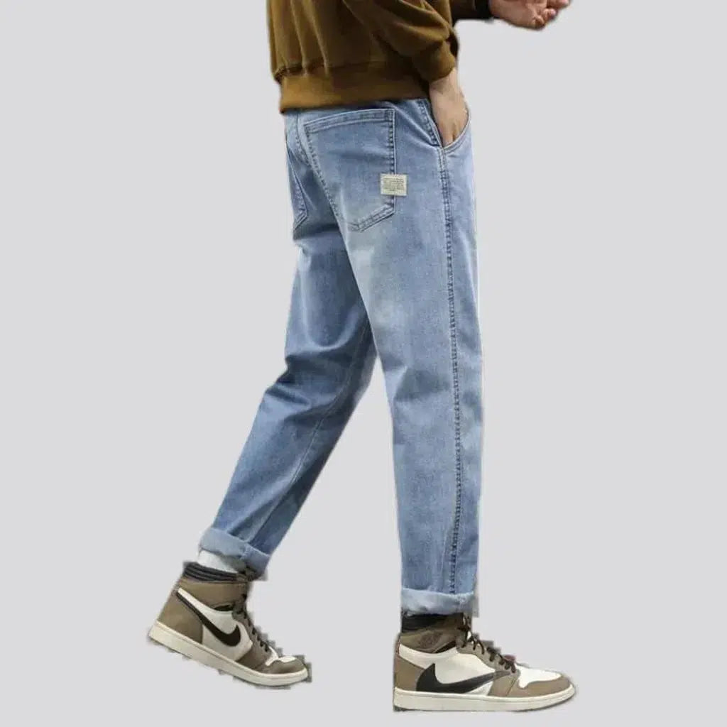 Elevated waistline sanded jeans