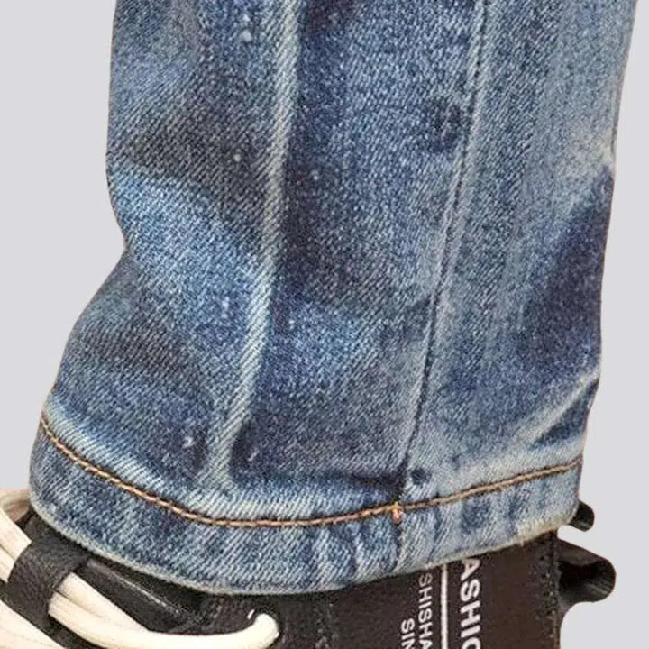 Light wash men's grunge jeans