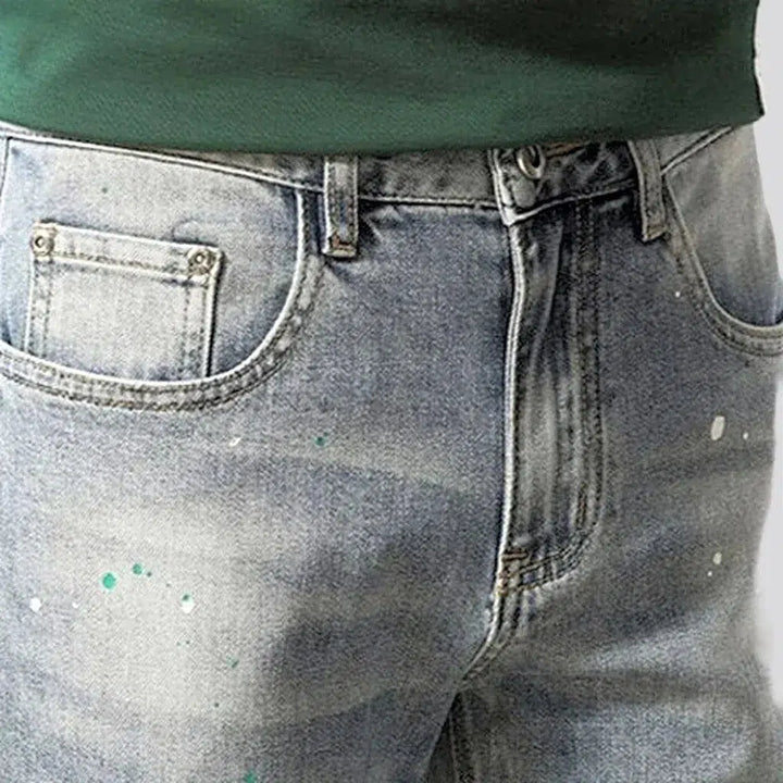 Grunge men's distressed jeans