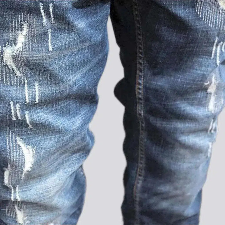 Grunge dark men's wash jeans