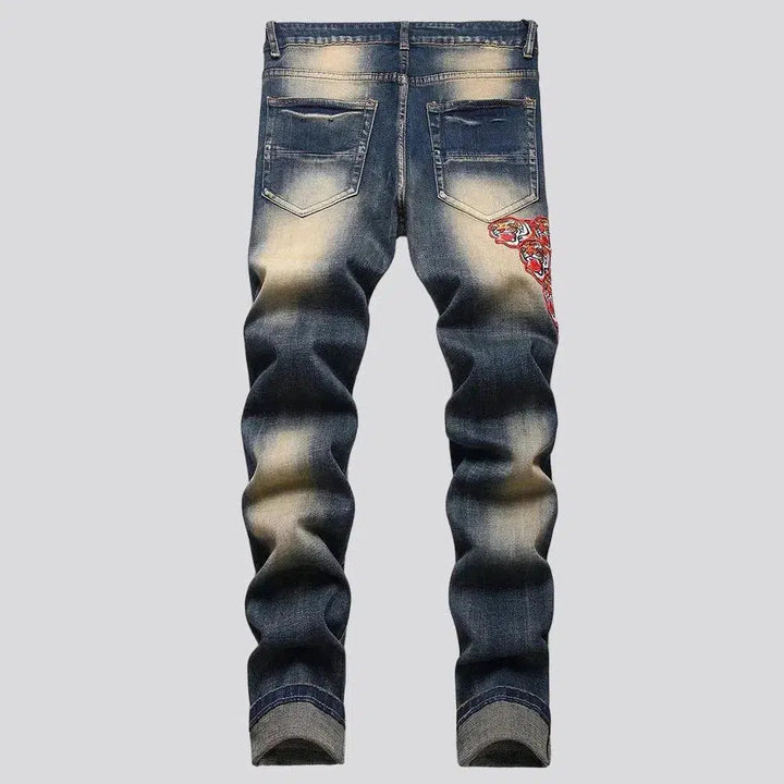 Mid-waist men's patched jeans