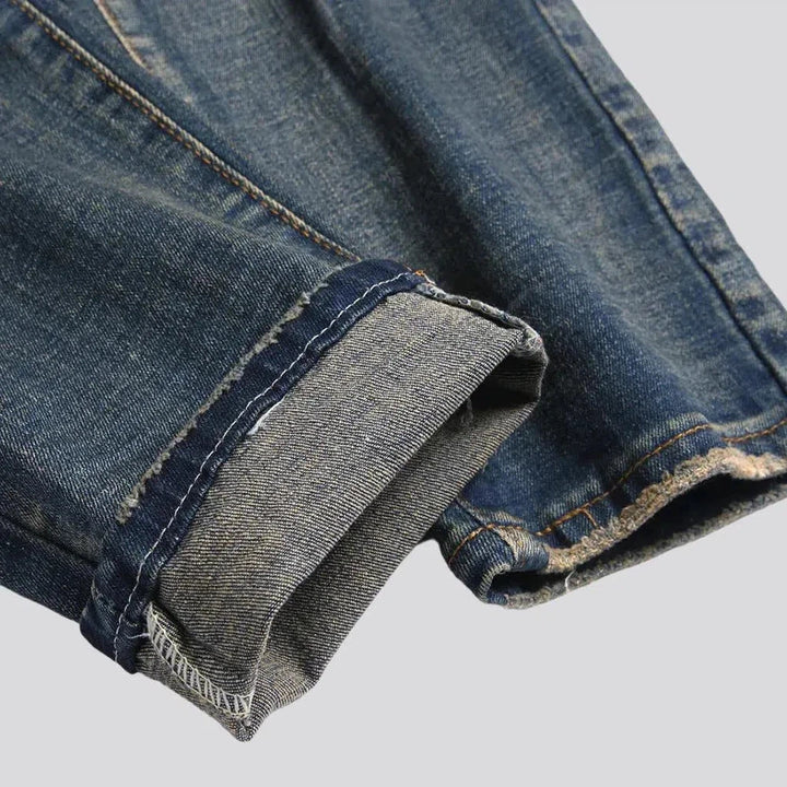 Mid-waist men's patched jeans