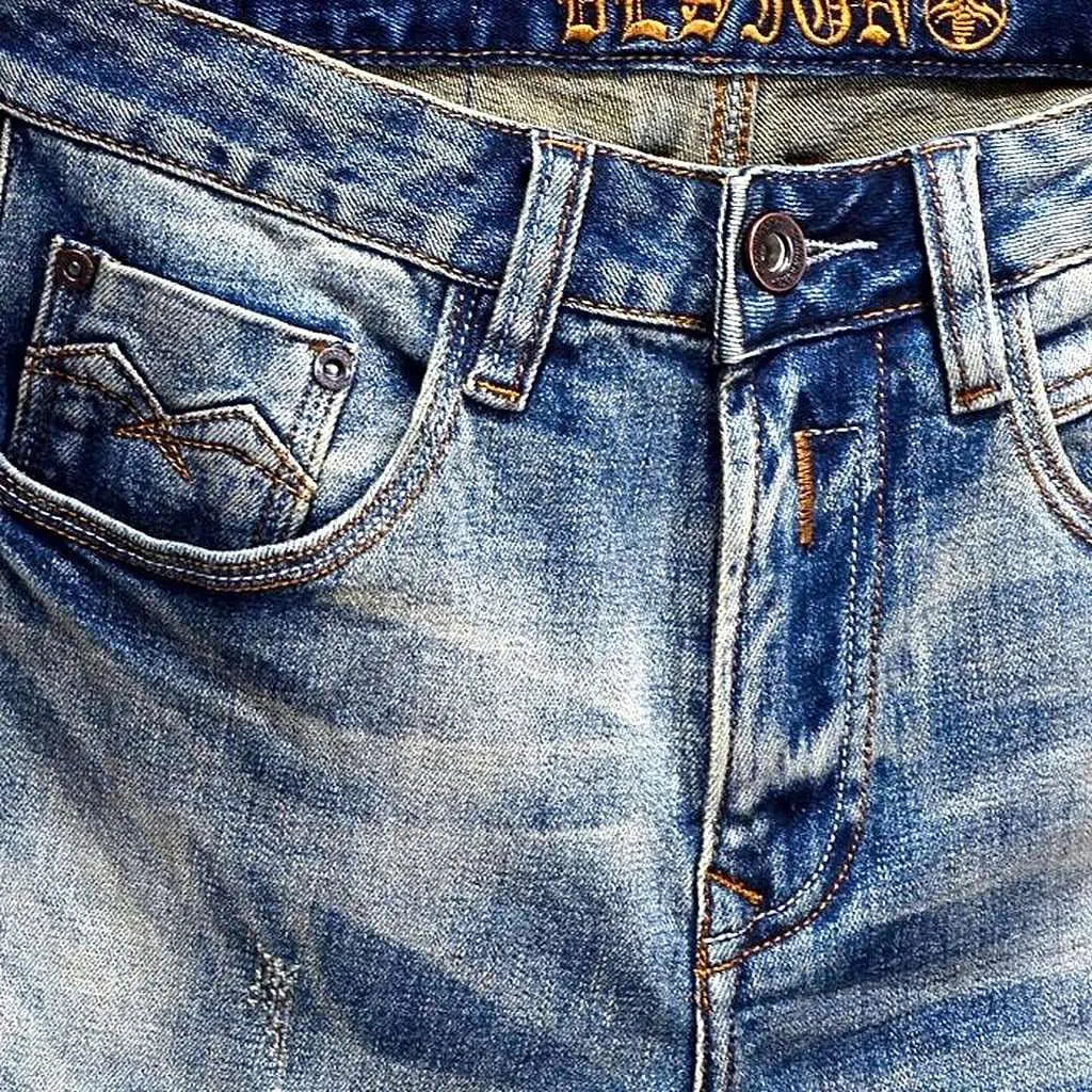 Slightly torn men's vintage jeans