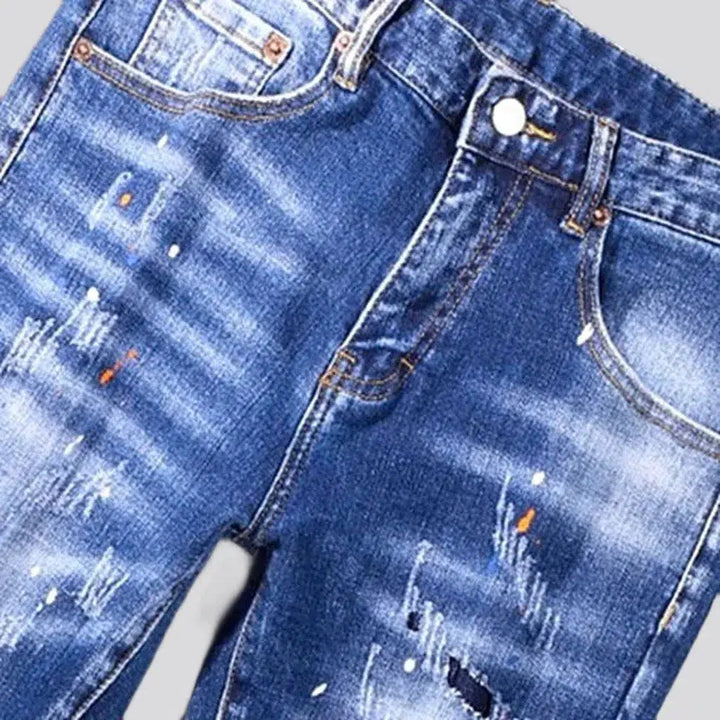 Whiskered medium wash jeans
 for men