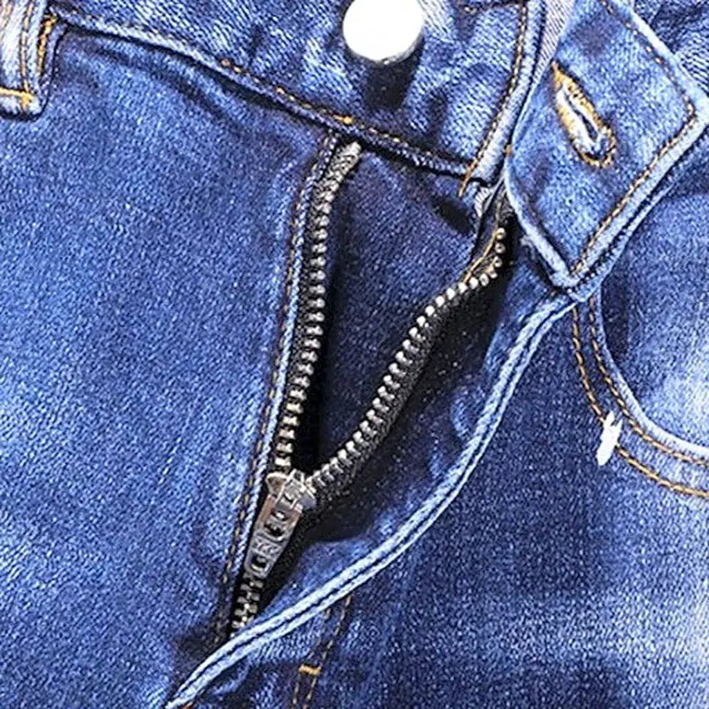 Whiskered medium wash jeans
 for men
