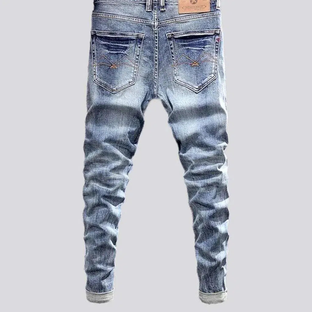 Slightly torn street jeans
 for men