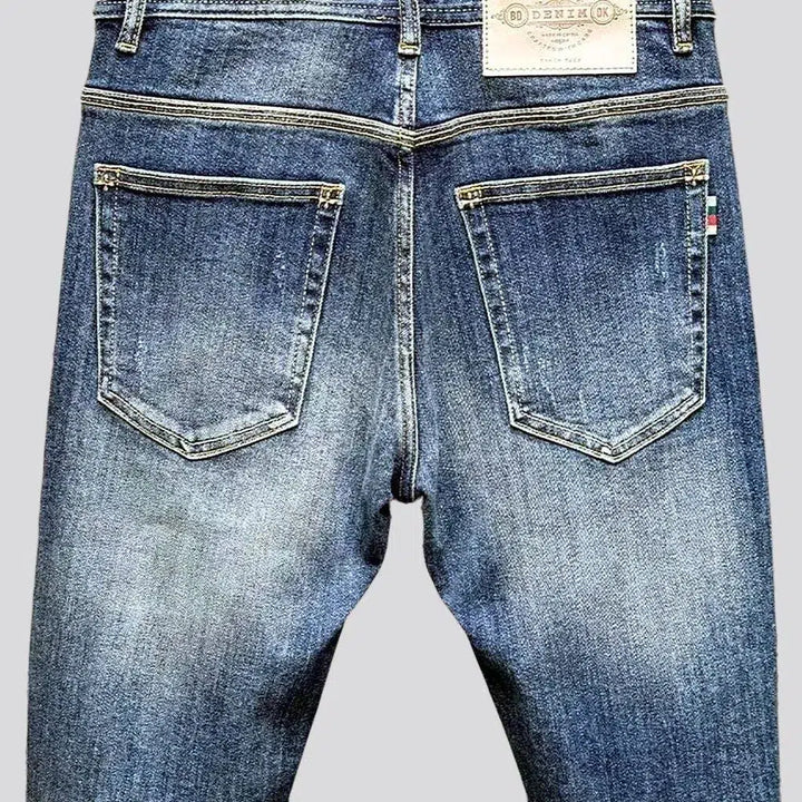 Medium wash men's slim jeans