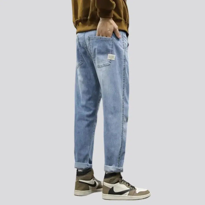 Elevated waistline sanded jeans