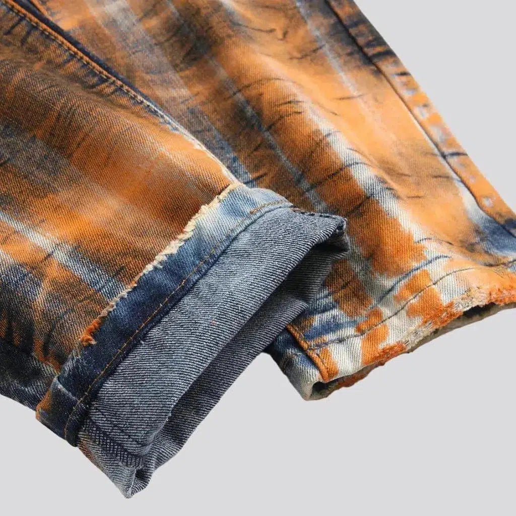 Light-wash men's painted jeans