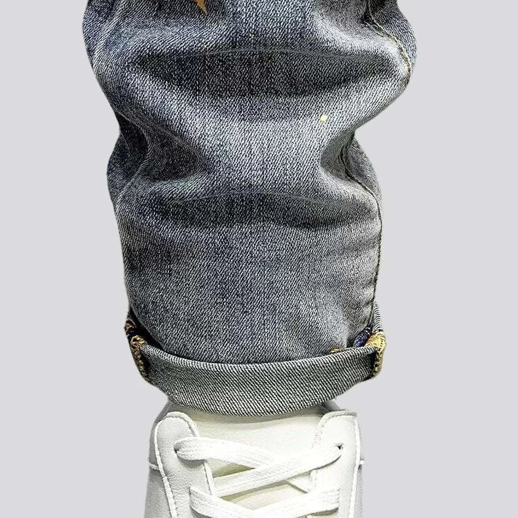 Distressed grey cast jeans
 for men