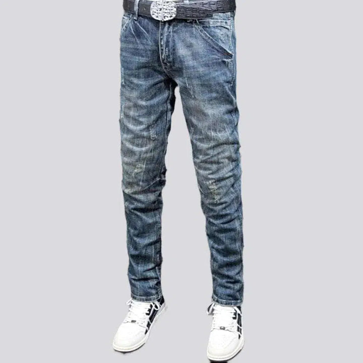 Vintage slightly men's torn jeans