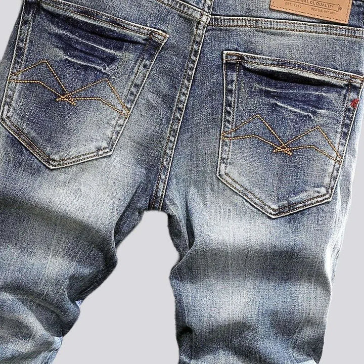 Slightly torn street jeans
 for men