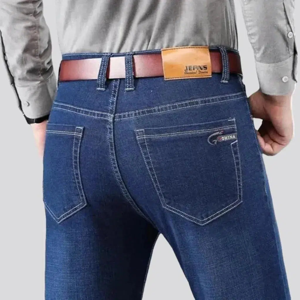 Mid-waist tapered jeans
 for men