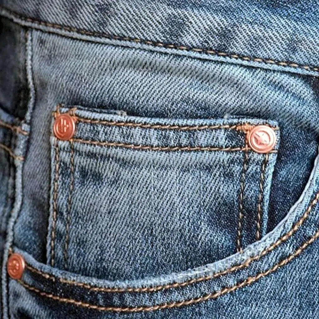 Light wash men's grunge jeans