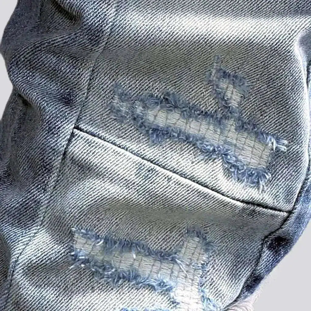 Distressed men's sanded jeans