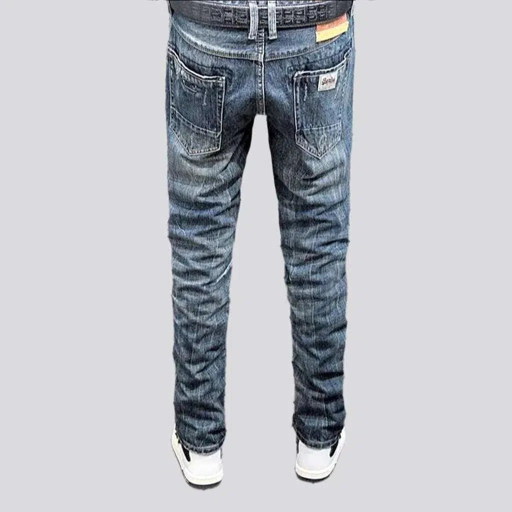 Vintage slightly men's torn jeans