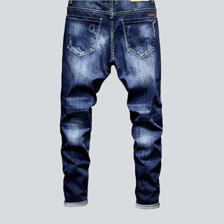 Dark wash whiskered men's jeans