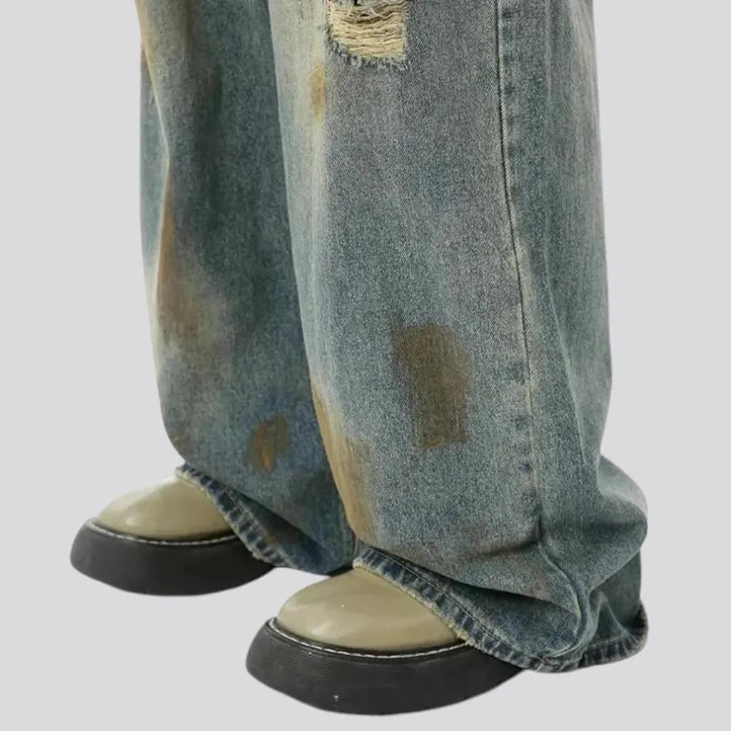 Boho style baggy distressed jeans for men