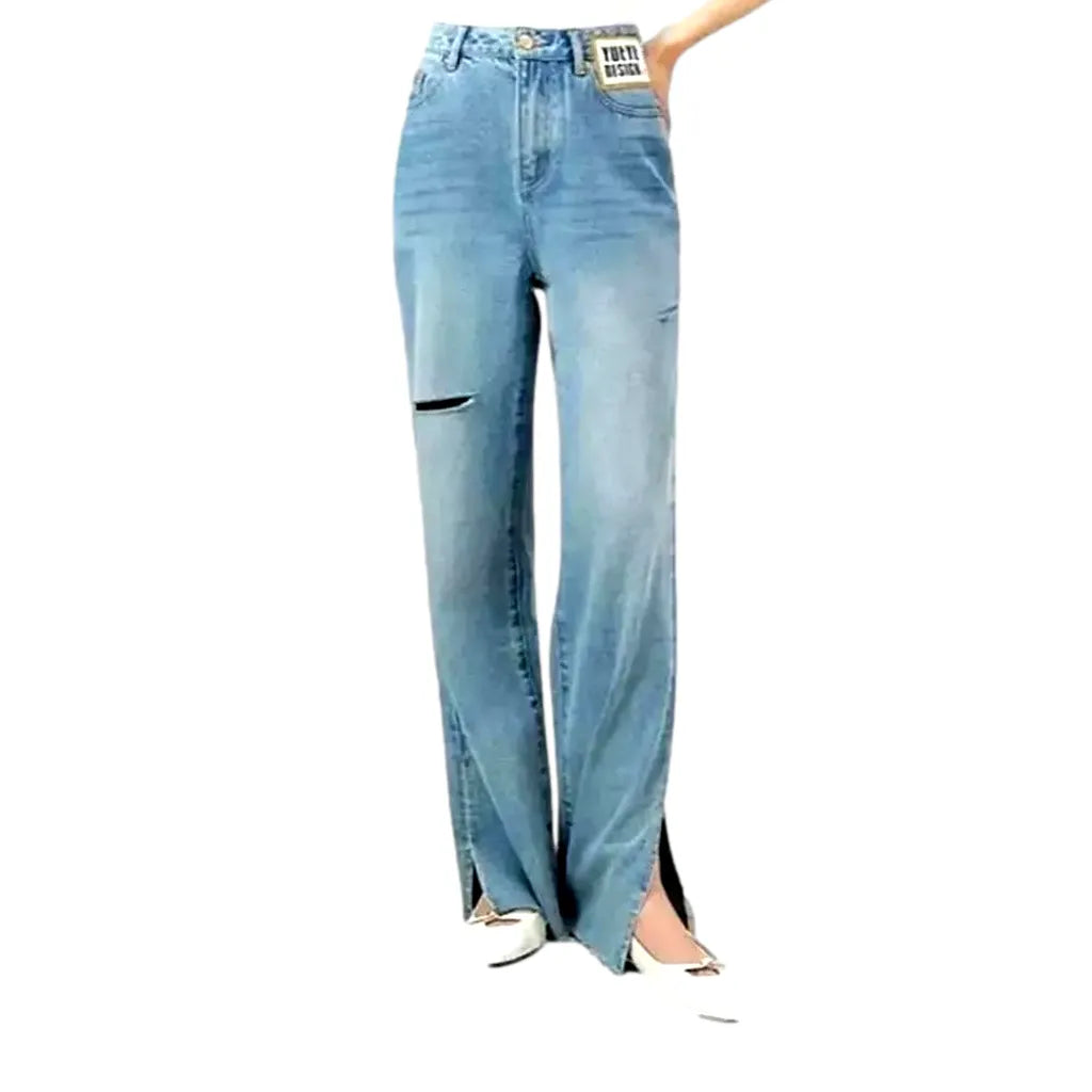 Fashionable Wide Fit Torn Women's Jeans - Light Blue