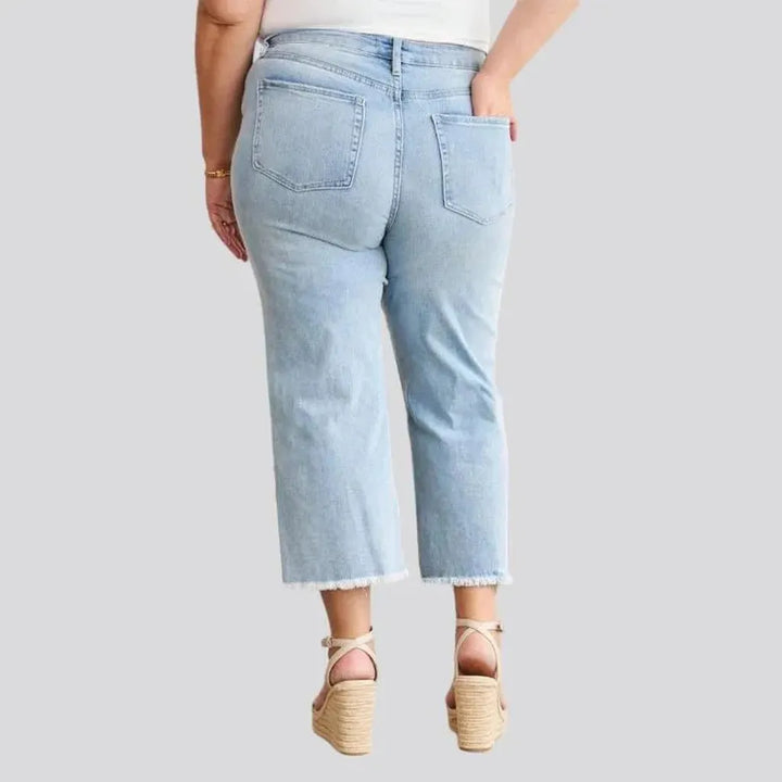 Distressed women's raw-hem jeans