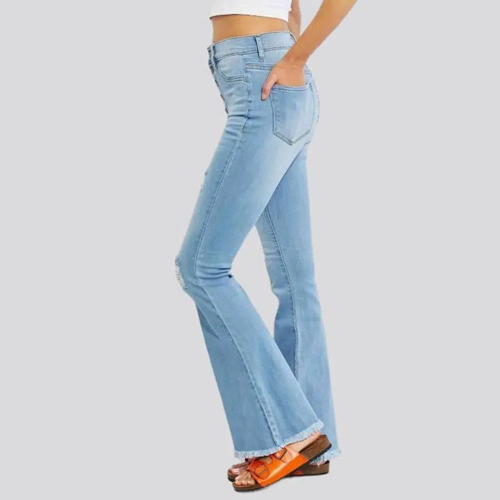 Raw-hem whiskered jeans
 for ladies