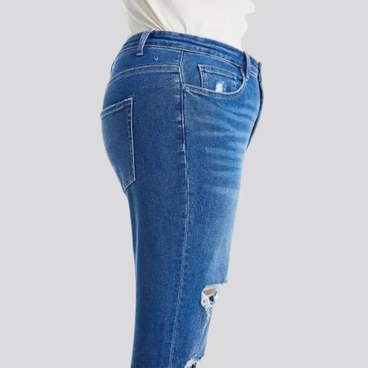 High-waist whiskered jeans