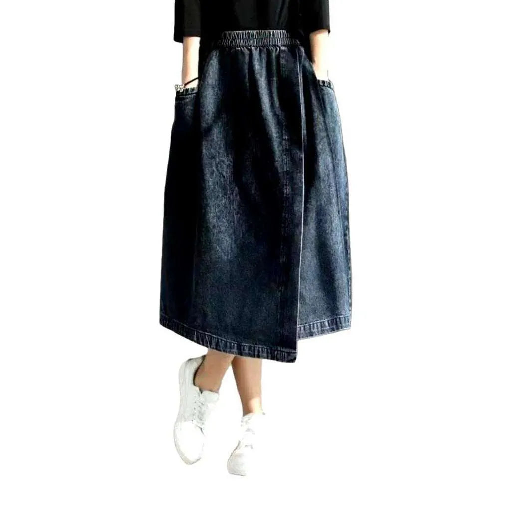 Asymmetric denim skirt with rubber