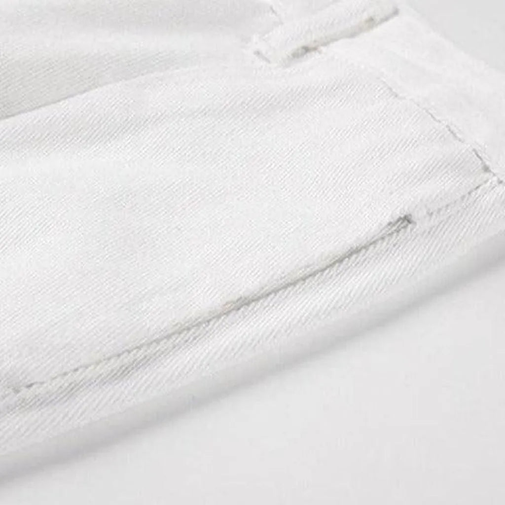 Distressed white women's baggy jeans
