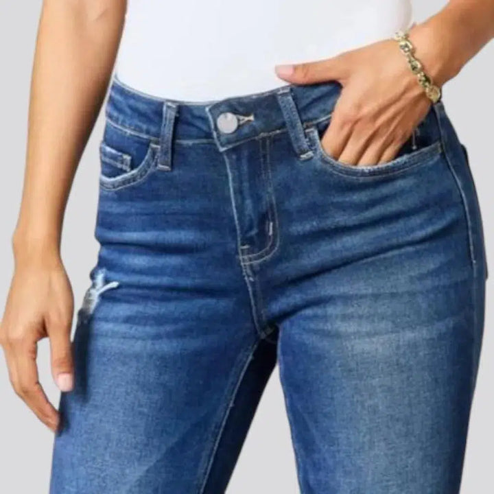 High-waist medium-wash jeans
 for ladies
