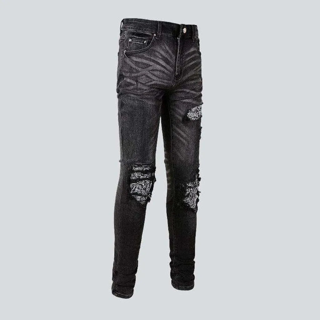 Vintage black ripped biker jeans