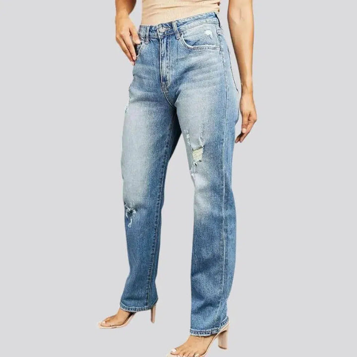 Distressed women's light-wash jeans