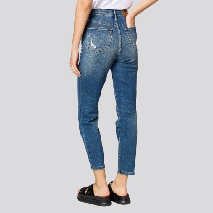 Stonewashed whiskered jeans
 for women