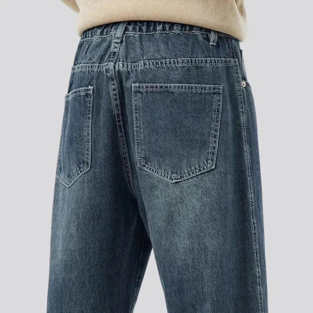 Mid-rise abraded baggy jeans for men