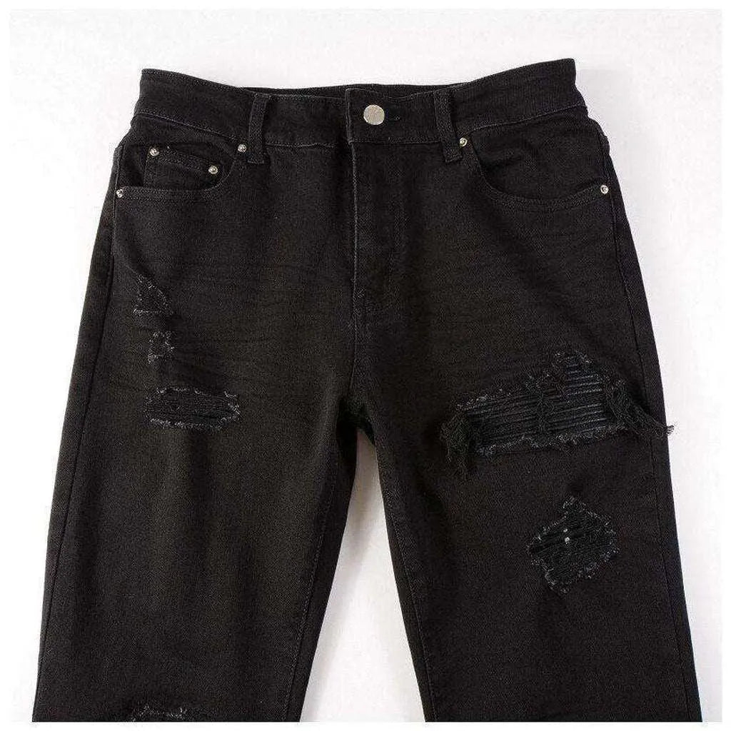 Black leather patch biker jeans