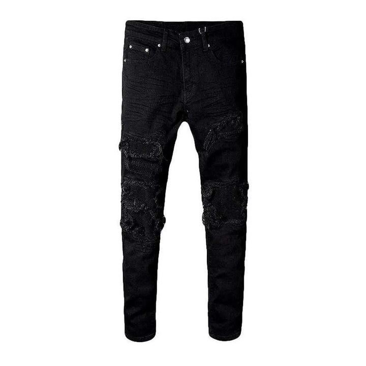 Black patch skinny biker jeans