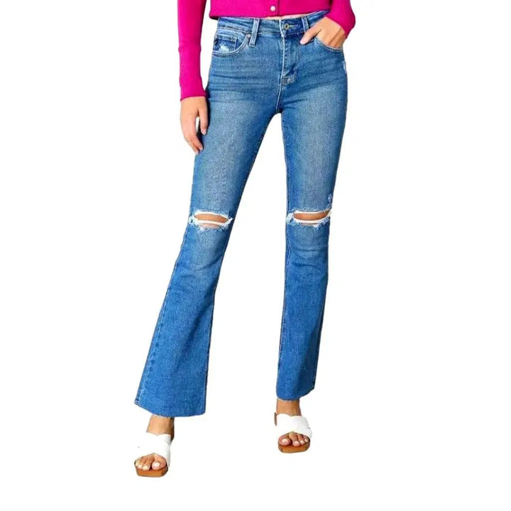 Bootcut women's ripped-knees jeans