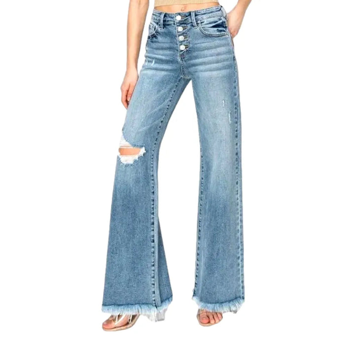 Buttoned sanded jeans
 for women